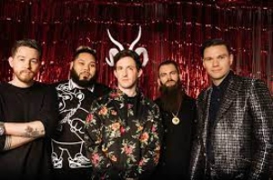 Tilian Pearson is welcomed back by Dance Gavin Dance following accusations of sexual abuse.