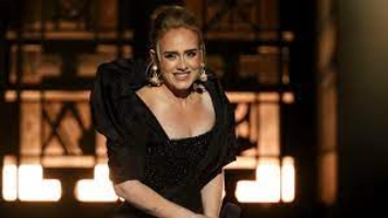 Adele apologises to her fans for the lengthy wait and calls her new album a "make up record."